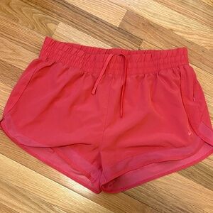 Women’s pink asics running shorts L